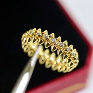 Luxury 18 km ongles diamant anneau affrontement de l'anneau Designer pour femmes bijoux 18 km en or titane titane en acier inoxydable anneau de fiançailles