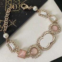 Luxe 18K vergulde armband ontworpen merkontwerper in roze voor modieuze schattige meisjes hoogwaardige diamant ingelegde trendy armband met doos voortreffelijk geschenk