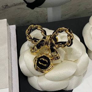 Luxury Brore de marque en or 18 carats de luxe en forme d'arc à la mode Brooch Brooch Broche de haute qualité pour femmes avec des accessoires de vêtements de fête en boîte
