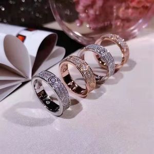 Anillo de amor de diamante completo de 3 filas de lujo, anillos de boda de moda para mujer, joyería de acero de titanio 316L de alta calidad