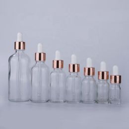 Flacon compte-gouttes en verre de luxe 5 ML-100 ML bouteille d'huile essentielle cosmétique transparente avec bouchon en or Rose en Stock