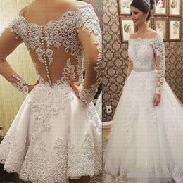 Robes de mariée de luxe appliquées sur l'épaule perlée cristal jupes sur mesure manches longues Illsuion robe de mariée de mariage courte