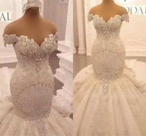Appliques de luxe dentelle robes de mariée sirène 2024 train détachable élégant épaule cristal dos nu volants arabe Dubaï robes de mariée