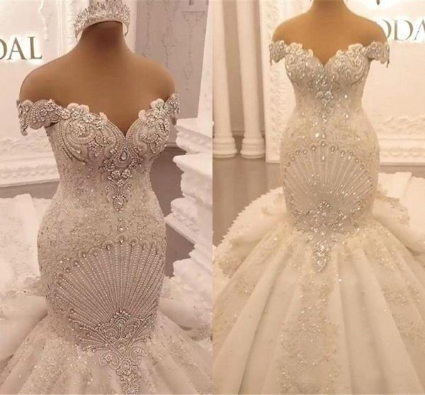 Apliques de lujo Vestido de novia de sirena de encaje 2023 Elegante fuera del hombro Cristal Sin respaldo Volantes Árabe Dubai Vestidos de novia Vestidos De Noiva