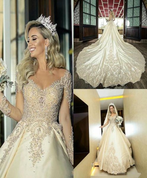 Luxury árabe Dubai Vestidos de novia de cuello transparente Catedral de manga larga Capilla Capilla Vestidos nupciales Vestidos de Novia Plu1853867