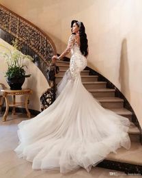Luxe Arabische Zeemeermin Trouwjurken Dubai Sprankelende Kristallen Lange Mouwen Bruidsjurken Hofsleep Tule Rok robes de mariee