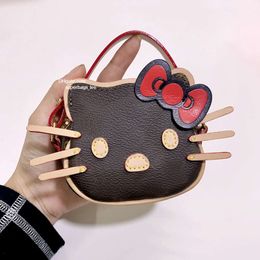 Accessoires de sac de luxe femmes mini sac portefeuille de dessin animé en cuir véritable chaîne de mode porte-clés sacs de créateurs hommes sac casque avec boîte