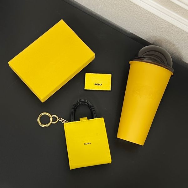 Sacs de luxe unisexe porte-clés jaune lettre porte-monnaie porte-clés femmes et hommes Mini sac fourre-tout sac pour écouteurs suspendus sac à bandoulière design Totes porte-clés breloques