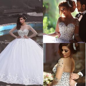 Robes de mariée robe de bal de luxe O cou manches longues perlées tulle saoudien arabe robes de mariée robe de mariée à lacets Bling strass perles