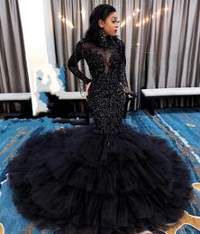 Luxe zwart prom -jurken 2023 lange mouwen paillin zeemeermin feestjurk hoge nek tassel avondjurken vestido de soiree