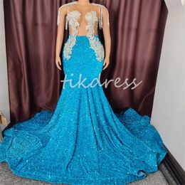 Vestidos de fiesta de lentejuelas azules de lujo con vestido de noche de sirena brillante de cristal de diamantes de imitación 2024 con borla O cuello Vestido formal de talla grande brillante Elegante cumpleaños Chica negra