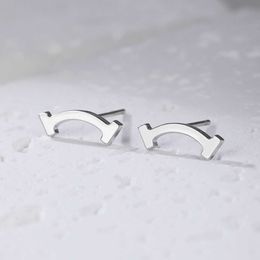 Brand de lujo 925 Silver T Home High Edition y Smooth Smiling Face Instagram Earrings Pendientes Temperamento de estilo de pareja Commuting Noble con logotipo