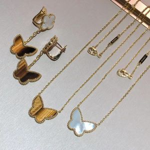 Brand de luxe Colliers de créateurs de trèfle mignon de papillon pour femmes 18 km en or Tigereye Stone courte couchel de cou