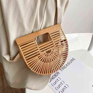Marque de luxe Design évider sacs à main bambou femmes sacs à bandoulière 2021 été tissé plage fourre-tout sacs de messager femme sac à main Y21112406