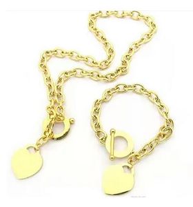 Luxury merkontwerper hart hanger ketting armband 2 stks set hoogwaardige roestvrijstalen mode bedelarmbanden kettingen voor paar heren en dames