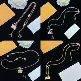 Luxury merk Designer sieraden hangsel ketting bagage dames 18K vergulde roestvrijstalen hangers ketting dames bruiloft sieraden accessoires