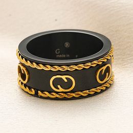 Bague de créateur de marque de luxe, bagues d'amour noires unisexes avec boîte d'emballage de bijoux pour femmes, nouvelle bague cadeau en acier inoxydable, bijoux de charme en acier inoxydable ne se décolore jamais