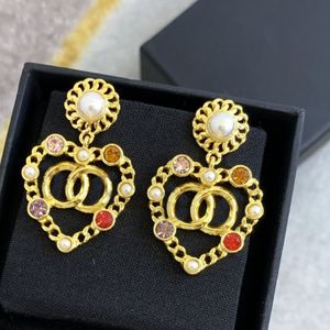 Boucles d'oreilles de pote de créateurs de marque de luxe Femmes Femmes Crystal Rignestone Perl Earres Bijoux de mariage3238j