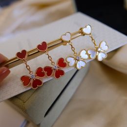 Bijoux de fête de marque de luxe pour femmes, boucles d'oreilles d'amour à quatre cœurs, trèfle doux Alham, boucles d'oreilles en pierre d'agate rouge