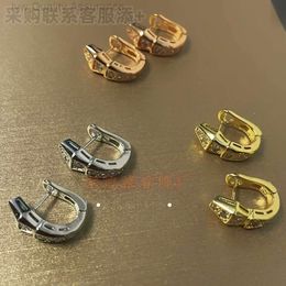 Pendiendo de diseño de pendientes de bulgaros de lujo para mujer arete de serpiente de encanto Baojia mismo estilo pendientes en forma de serpiente de diamantes de una sola fila con versión alta de acero titanio D