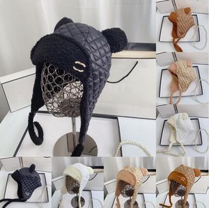 Casquette de luxe Designer Chapeau de seau en laine d'agneau hiver extérieur chapeaux à large bord marque de mode lettres homme femme garder au chaud chapeau à oreillettes chapeau de pêcheur accessoires de mode