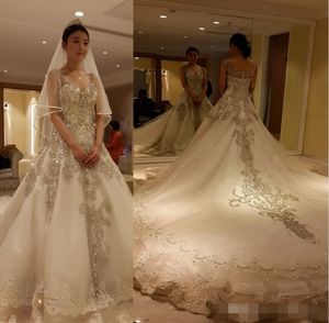 Vestidos de novia de Cenicienta de tren de catedral de lujo 2019 con correas de novia Con cuentas de cristal Rhinestone Ilusión Princesa Vestidos de fiesta nupciales