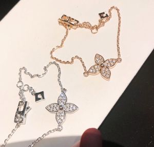 Luxe ketting armbanden monogram merkontwerper topkwaliteit S925 sterling zilveren kristal vier blad klaverse bedelarmband voor vrouwen feest geschenk sieraden