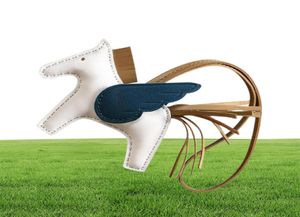 Chaîne de luxe de haute qualité Real Mouton en cuir volant Pony Horse Key Ring pour femmes Charm Sac Pendentif Car Miroir Miroir Keychain7722657