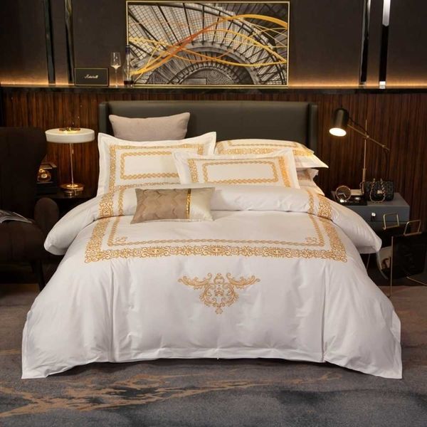 Juego de funda nórdica bordada de oro elegante de lujo Juego de sábanas de cama suave de algodón egipcio blanco Premium Hotel Queen King size 4Pcs T200706