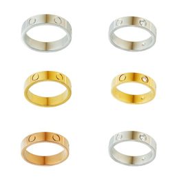 Anillo de pareja clásico de lujo Diseñador unisex Tornillo de acero Aleación de acero Desvanecimiento de oro Joyería de moda Chapado en plata Cristal Amor