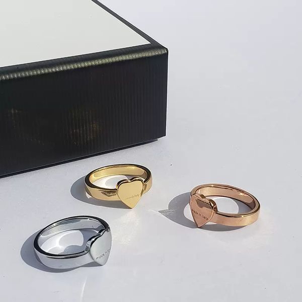 Luxury Classic Simple Heart Love Ring Ring Gold Silver Rose Acero inoxidable Pareja Ring Fashion Ladies Diseñador Joyas Damas Regalo de fiesta