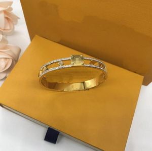 Pareja de lujo Snap Micro Inlays Pulsera de cristal Diseñador de marca Cobre Trébol de cuatro hojas Flor Brazalete abierto para mujeres Hombres Joyería con caja Fiesta Regalo de Navidad