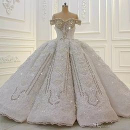 Vestido de novia con cuentas de cristal de lujo 2022 Robe De Mariee Vestido de fiesta con hombros descubiertos Vestido de novia Cuello barco Sin espalda Vestidos de boda del Líbano