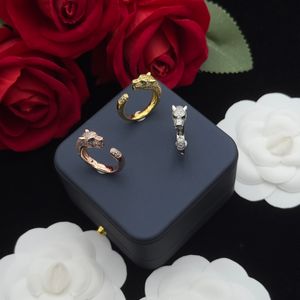 Bague de luxe en cristal marque fiche de fiançailles pour femmes mode diamant léopard motif de paire ouverte anneau de haute qualité en acier inoxydable en acier inoxydable bijoux