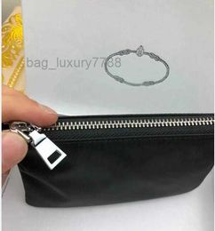 Porte-clés de luxe Designer Pochette en toile de nylon Hommes Femmes Mini portefeuilles Porte-clés Noir Zip Pocket Purse Amant Porte-clés Porte-cartes Porte-clés Accessoires de mode