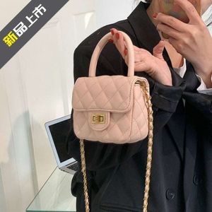 Luxe designtassen zijn goedkoop om te verkopen Elegante en dames klassieke kleine geurige wind Mini handheld rode envelop sleuteltas Pu enkele schouder crossbody