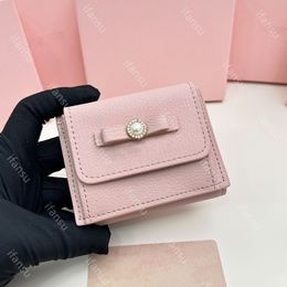 Luxe ontwerp echt leer damesmode casual boog draagbare kaarttas multifunctioneel schattig kort high-end nul portemonnee roze zwart