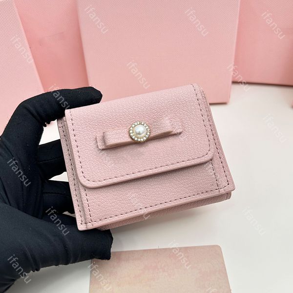 Design de luxe en cuir véritable pour femmes, mode décontractée avec nœud, sac à cartes portable multifonctionnel mignon court haut de gamme zéro portefeuille rose noir