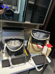 Design de luxe dames classiques drawstring mini sac à guichets sac à ordures chaîne de perle du milieu super belle vieille rat-gilt tout le tout épaule unique