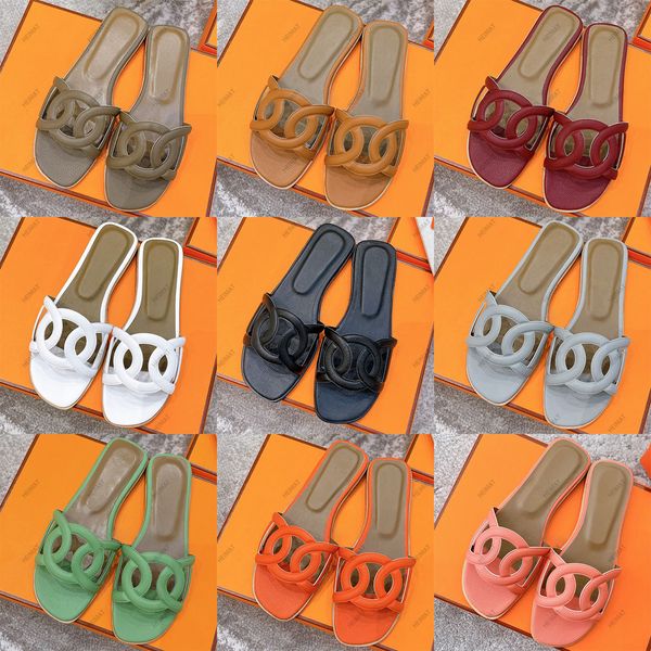 Diseño de lujo para mujer Sandalias con nariz de cerdo Zapatillas Esqueleto de cuero Moda Playa Zapatos planos casuales con caja y bolsa para el polvo