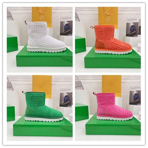 Diseño de lujo mujer moda 2 cm botas cortas de felpa cálidas piel de oveja una botas de nieve mujer alta calidad antideslizante hermosos zapatos de vestir para mujer