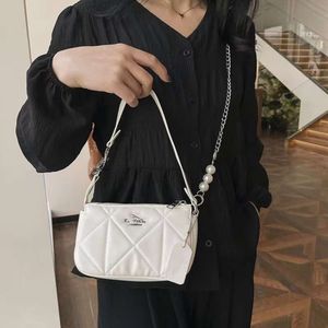 Sac de créateur de luxe 2024 Nouveau sac à cordes de perle de mode classique Sac à bandoulière Small Square Law Trendy Stick Underar Arar Bags Womens Factory Vente Top 5A