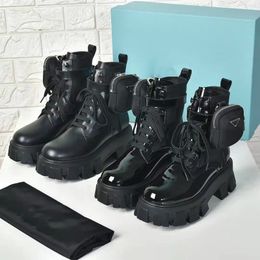 Sac de créateur de luxe bottes courtes bottes mi-tube pour femmes logo triangle en métal noir fond épais renforcé hiver chaud à lacets mode bottes de moto
