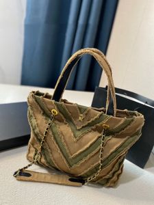 Sac de créateur de luxe patchwork à rayures en V sac à bandoulière chaîne Vintage sac fourre-tout en denim de mode sac chanail de marque