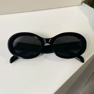 Lunettes de soleil de créateurs de luxe Classic Mens Women Goggle Senior Eyewear Fashion Small Round Frame Cat-Eye Sunglasses