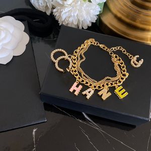 Luxe designer ketting armbanden sieraden letters mannen vrouwen klassiek 18k goud vergulde koperen armbanden mode honderd met accessoires paar armbanden