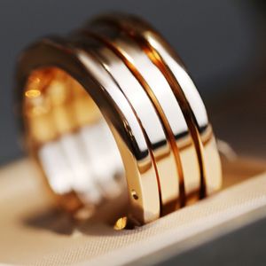 Luxe designerontwerpers ringen origineel ontwerp 585 Sterling Silver Spring Cilinder Matching Ring Men and Women Classic Fashion Paar luxe sieraden met boxtassen