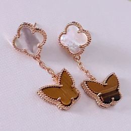 Pendientes de diseño de lujo Ear Stud Alta calidad Mujeres Marca Letra Rosa Oro Cobre Mariposa Pendiente Loop Drop Party Joyería de boda Regalos de Navidad