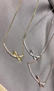 Collier de luxe avec nœud en diamant simple, de styliste, en or, argent, or rose, trois couleurs disponibles 9856370