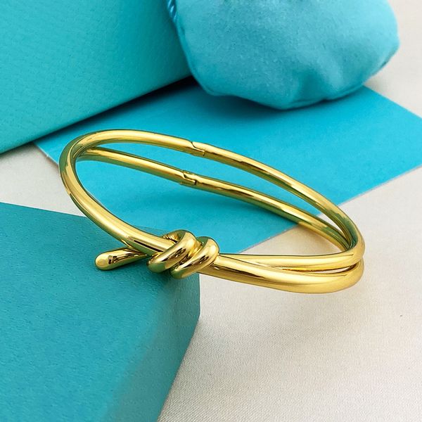 Bracelet de luxe Bracelet à arc en or Emballage Emballage des brins en acier inoxydable Coupages de bijoux pour copine Accessoires en gros